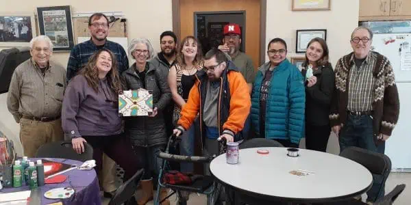 Volunteers and Six Points Clients Making an Art Project