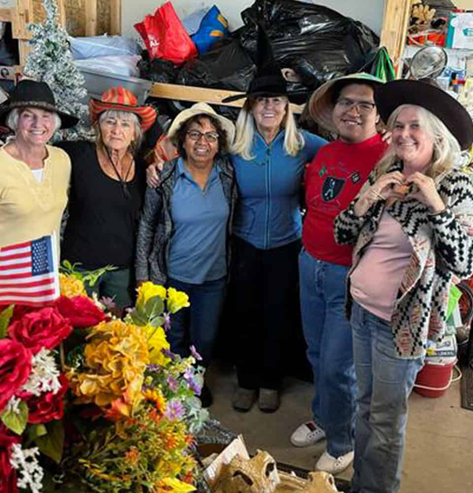 BoardStaff4 Six Points Staff dressed up in hats from the Thrift Store.